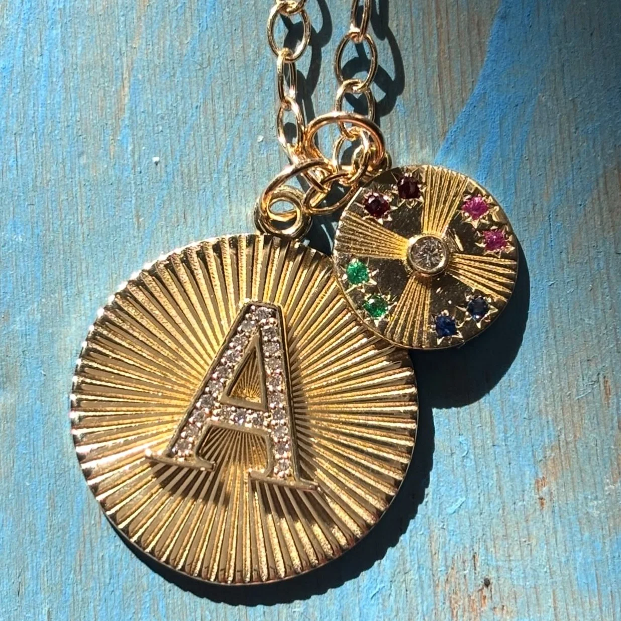 Perfect duo: Sunshine initial with diamonds and our mini birthstone disc on the Amalfi chain. A beautiful birthday gift celebrating a move to college. The birthstones are her siblings! 💜🩵❤️💚