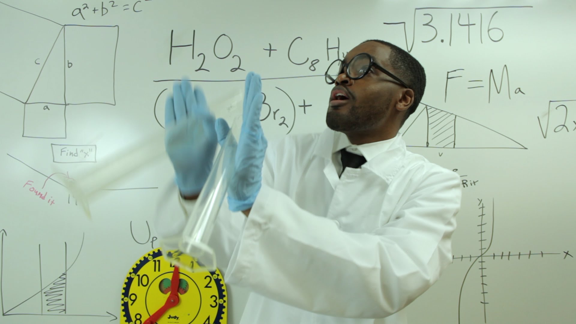 Scientist in front of board.JPG