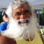 Samson “Uncle Santa Sam” Rodrigues, Program Manager, Surf Instructor