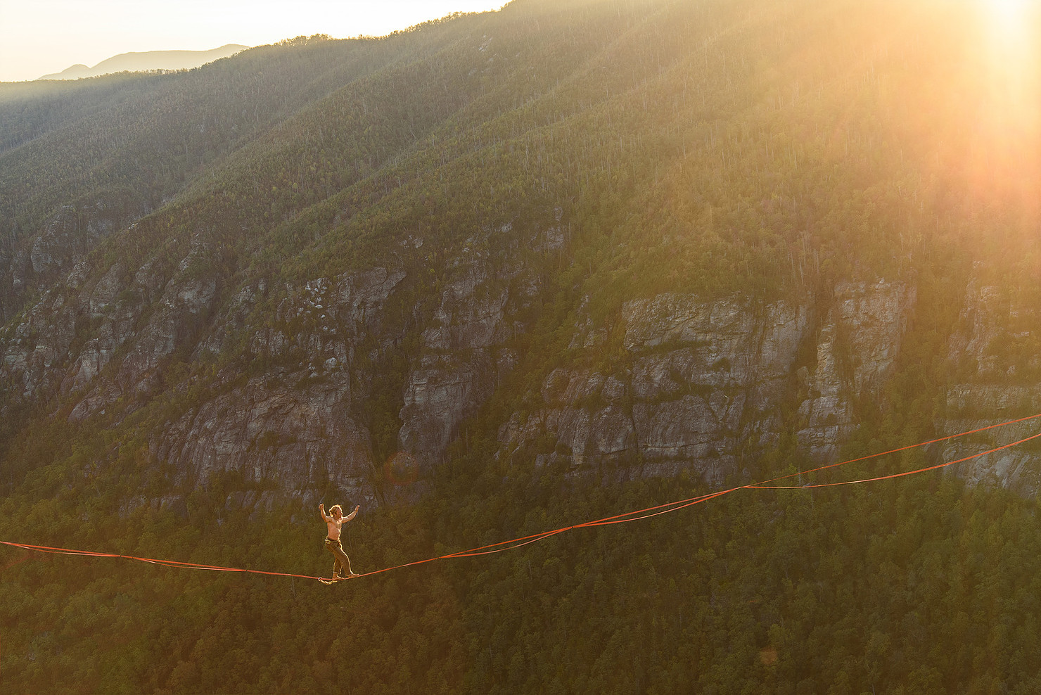 Dave Humphrey walking across Linville Gorgeous high above the valley floor.