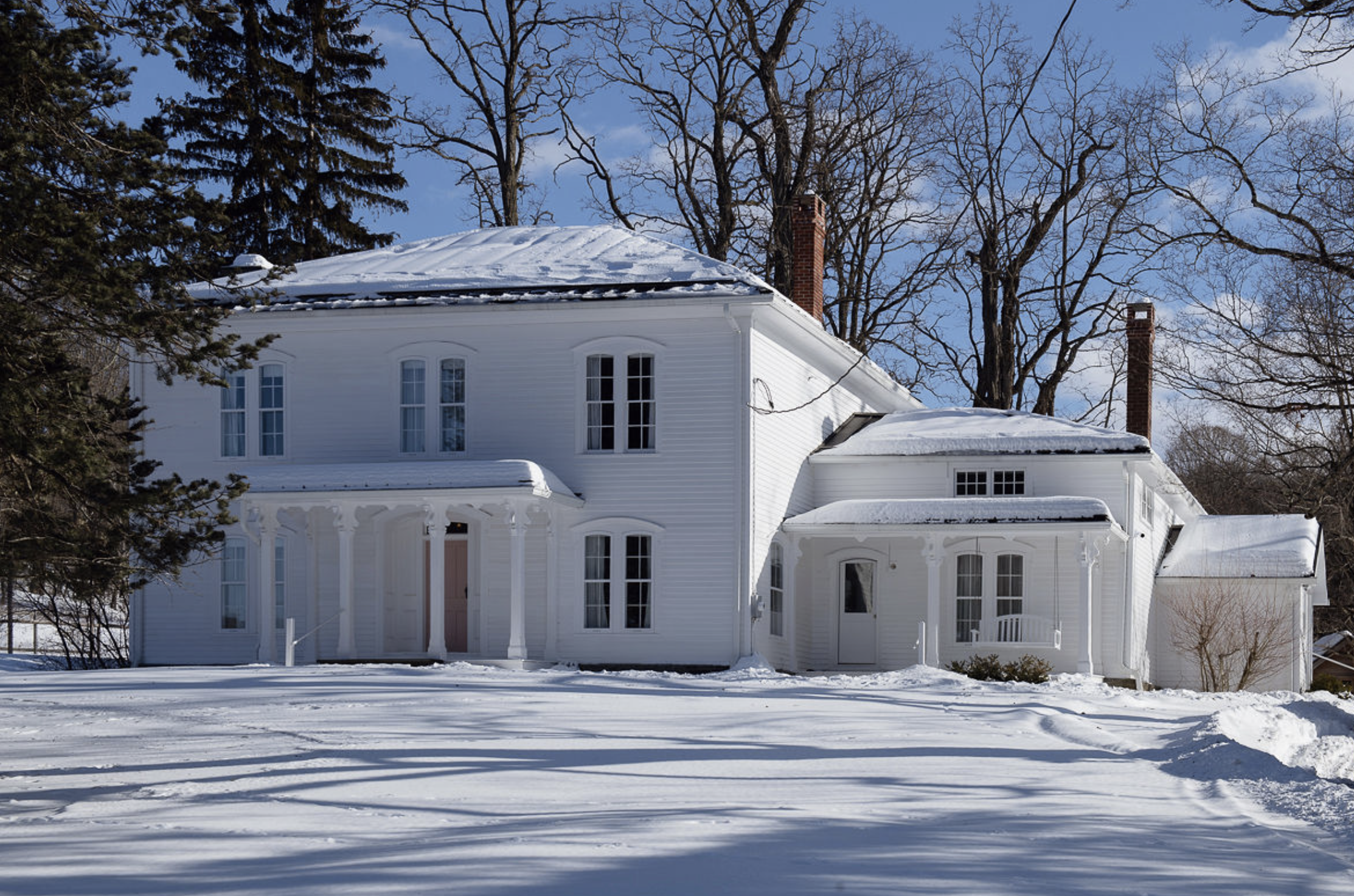 a stunning Italianate mansion set in a snow covered expanse