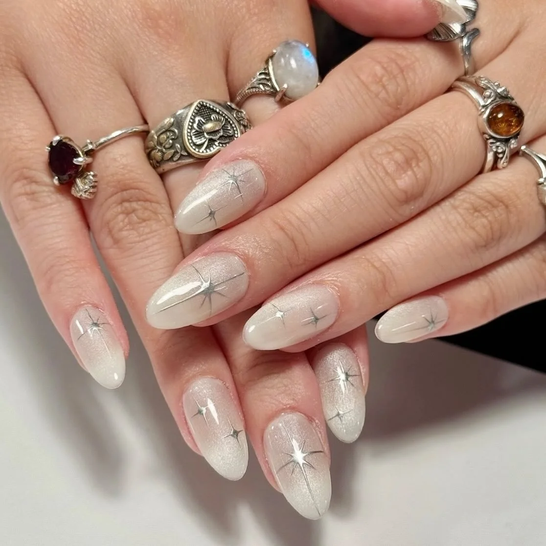 ✨Frosty cat eye, with silver 4 point stars ✨ 
DM or visit omynails.co.uk to book 💞
💅🏼OMY Nail Artist • @omyabi96 
💞Polish Used • @the_gelbottle_inc 
🧈Cuticle Butter • @omyetc 
💭Inspiration • ☁️❄️💫
#omynails #omyetc #naila