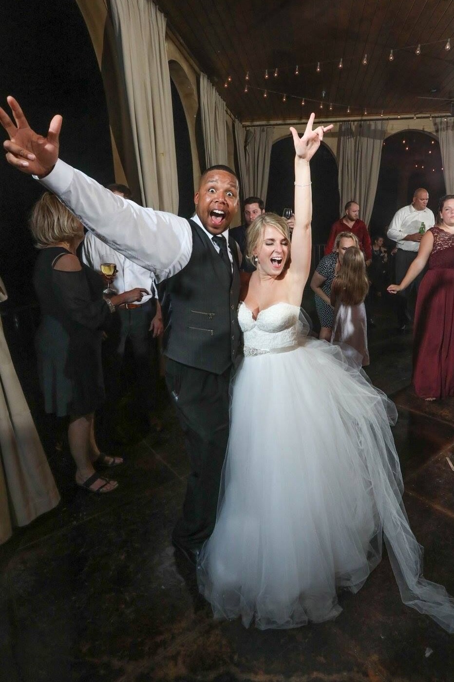 maindrewithbridehandsup.jpg