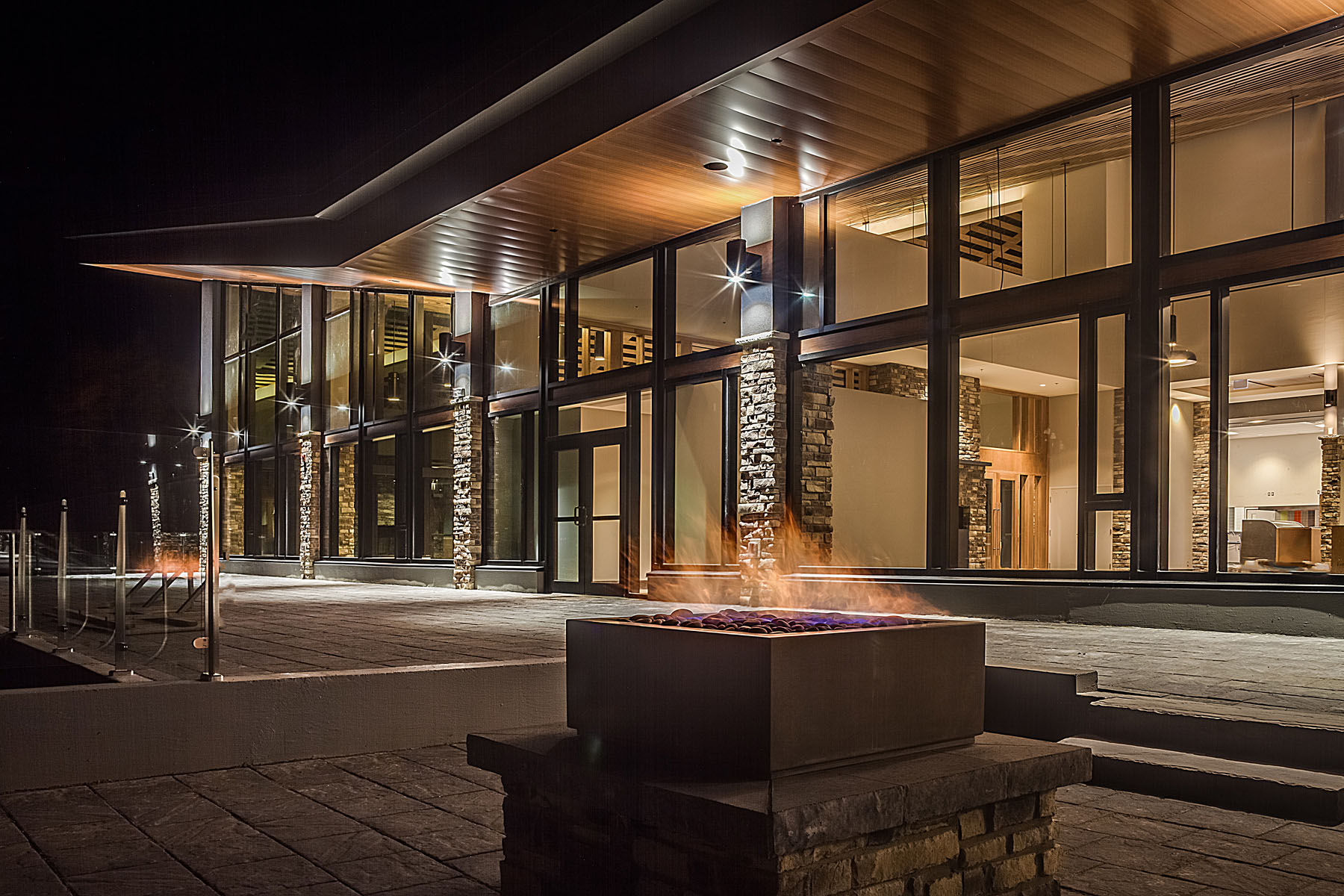 Fire pit Towards Heritage Lounge night.jpg
