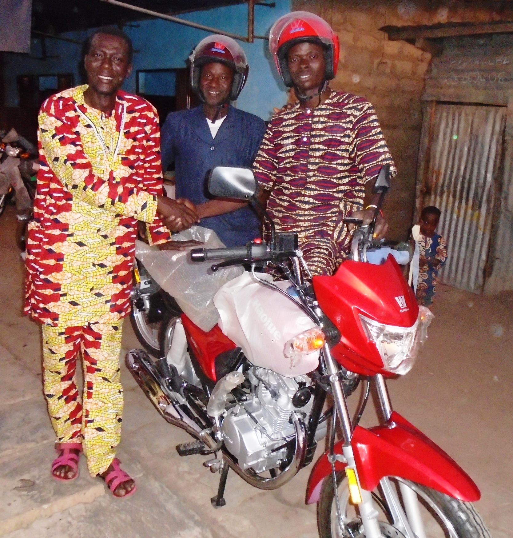 Pastor Pierre Agani Rejoicing With  Pastors Saturnine Amadji & Paul Dousoumon on Their Being Presented With New  Motorbikes.JPG