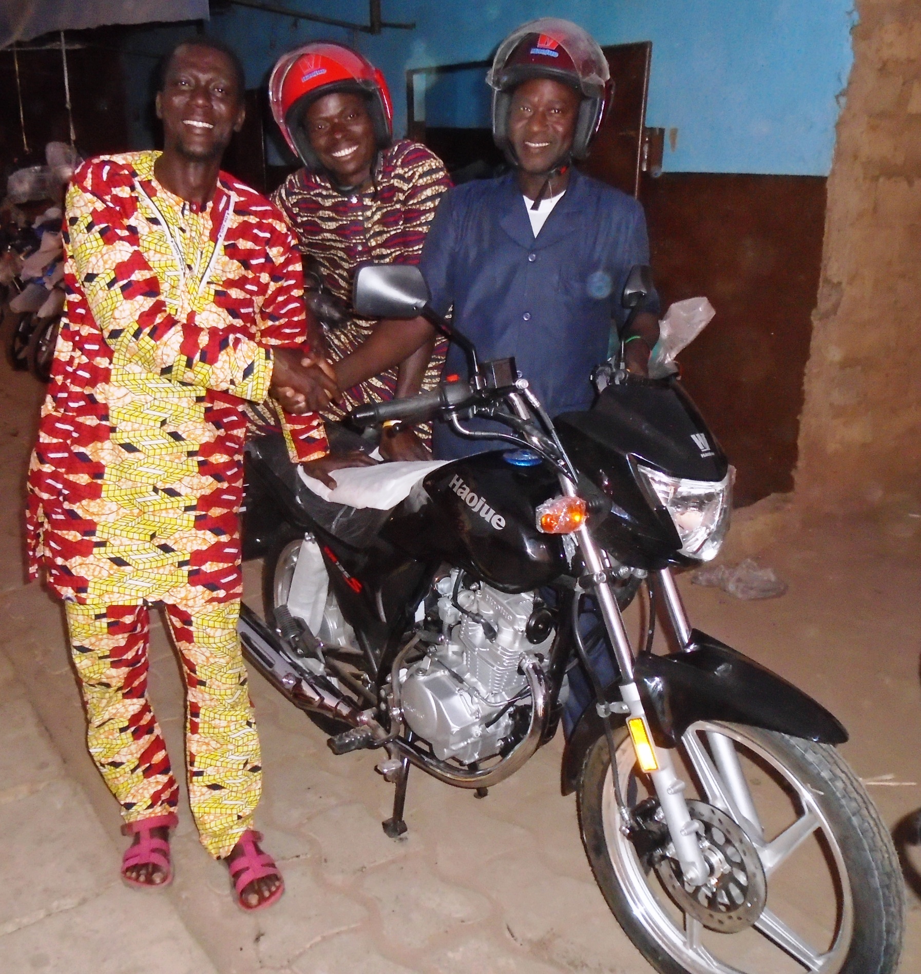 Pastor Pierre Agani Felicitating  With Pastors Saturnine Amadji & Paul Dousoumon on Their Being Presented  With New Motorbikes.JPG