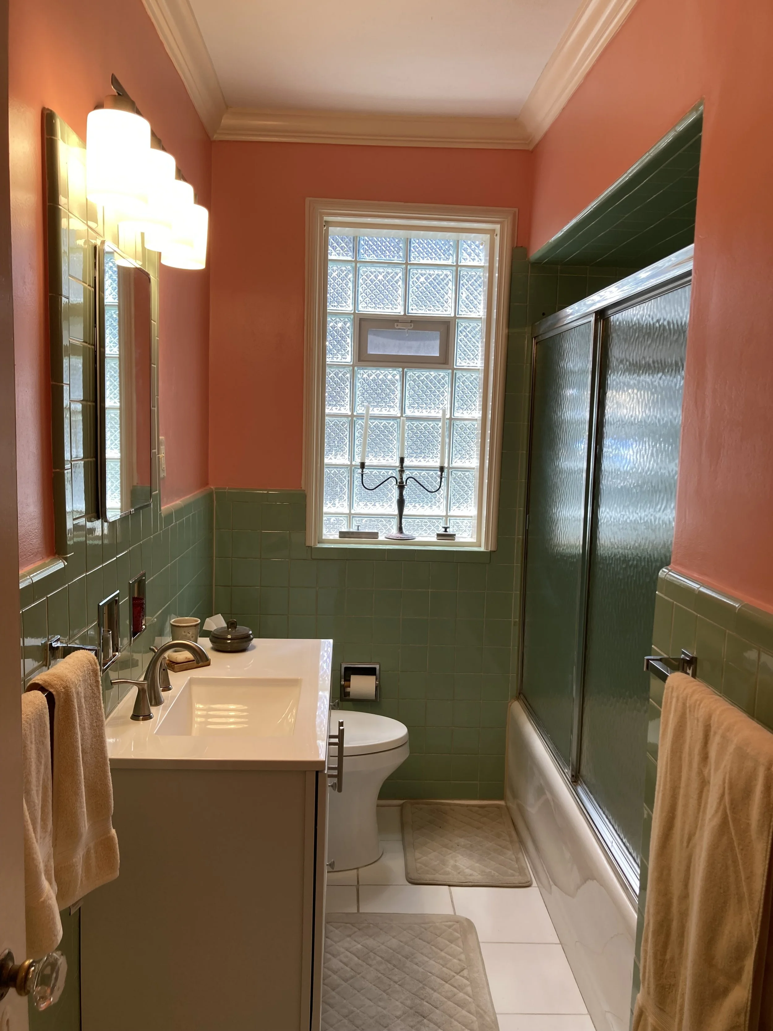 Simple bathroom upgrade - fixing and paint walls, repair window sill, new light fixture, repair broken floor tiles