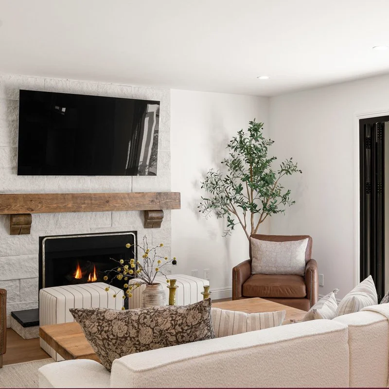 TV hung over a fireplace is too high