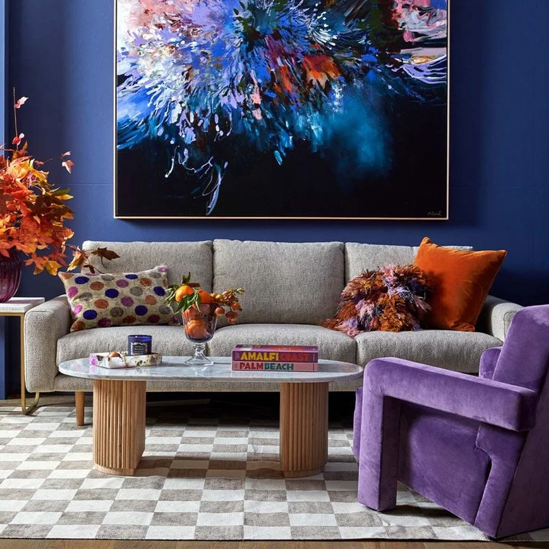 Colourful living room with large art on the wall