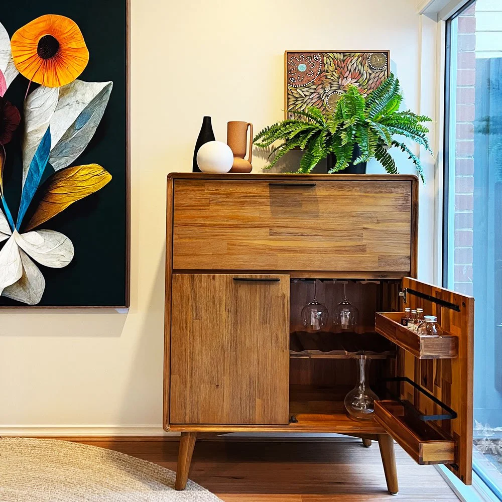 Open timber bar cabinet and art 