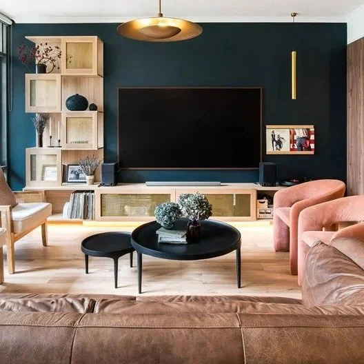 TV placed on dark wall to make it blend in