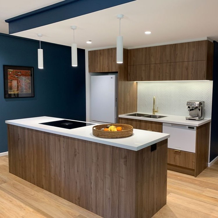 Small apartment kitchen design using Polytec Notaio Walnut designed by Hue and Space Interior Design
