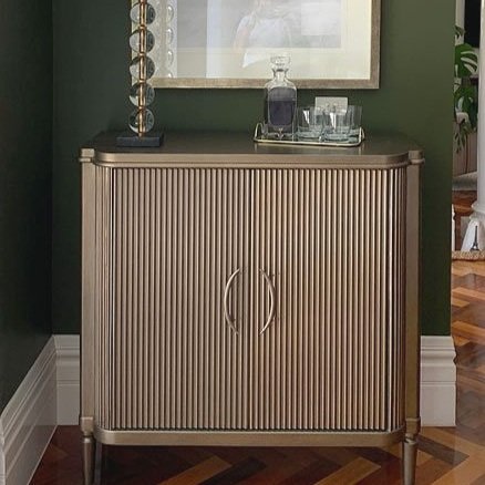 Bronze bar cabinet and crystal lamp with drinks tray dining room designed by Hue and Space Interior Design