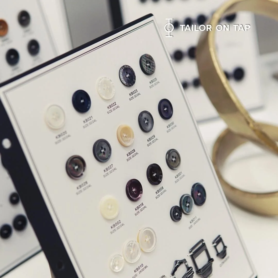 At Tailor On Tap, we help personalize your style in every details, big or small. That includes the buttons on your suit! We have a whole collection of buttons in many styles at our Tysons Corner Showroom. If you are not sure which style to go with, b