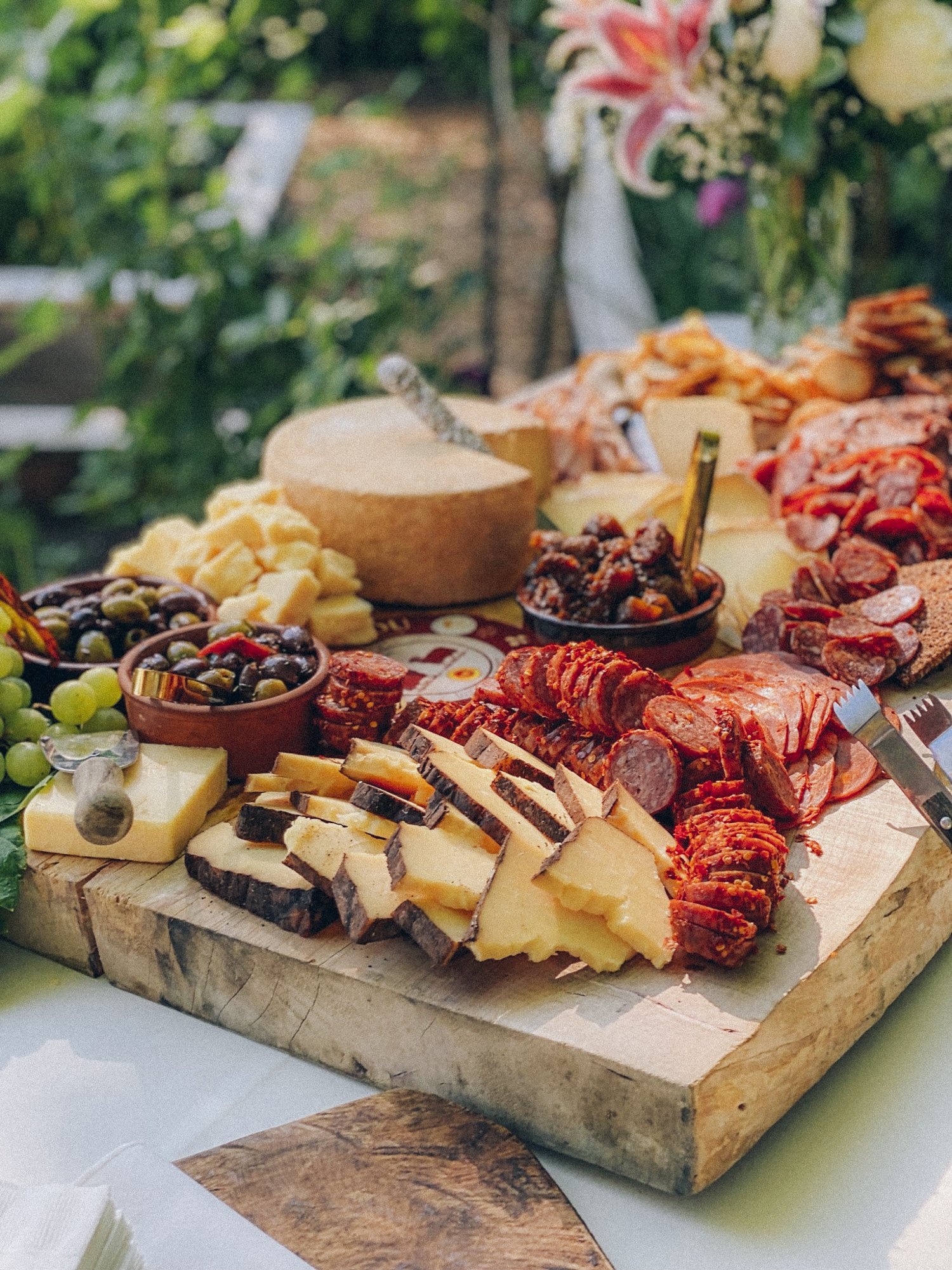 beautiful charcuterie board display for wedding event in portland oregon with fresh fruits cheese and charcuterie