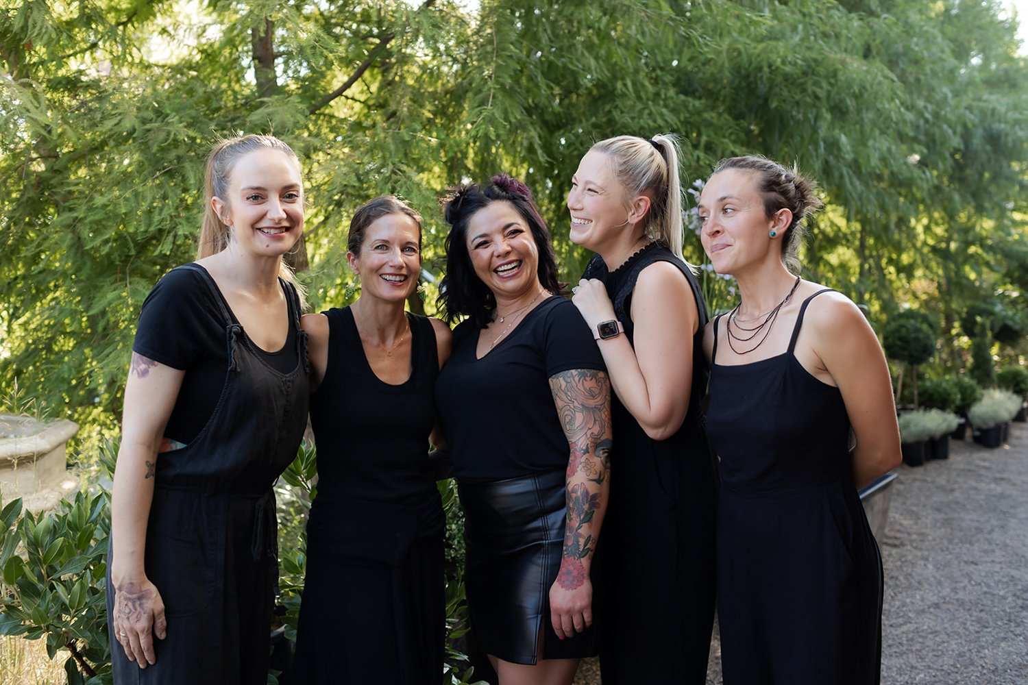 group of women laughing at wedding the team of art de cuisine women owned catering business in portland oregon