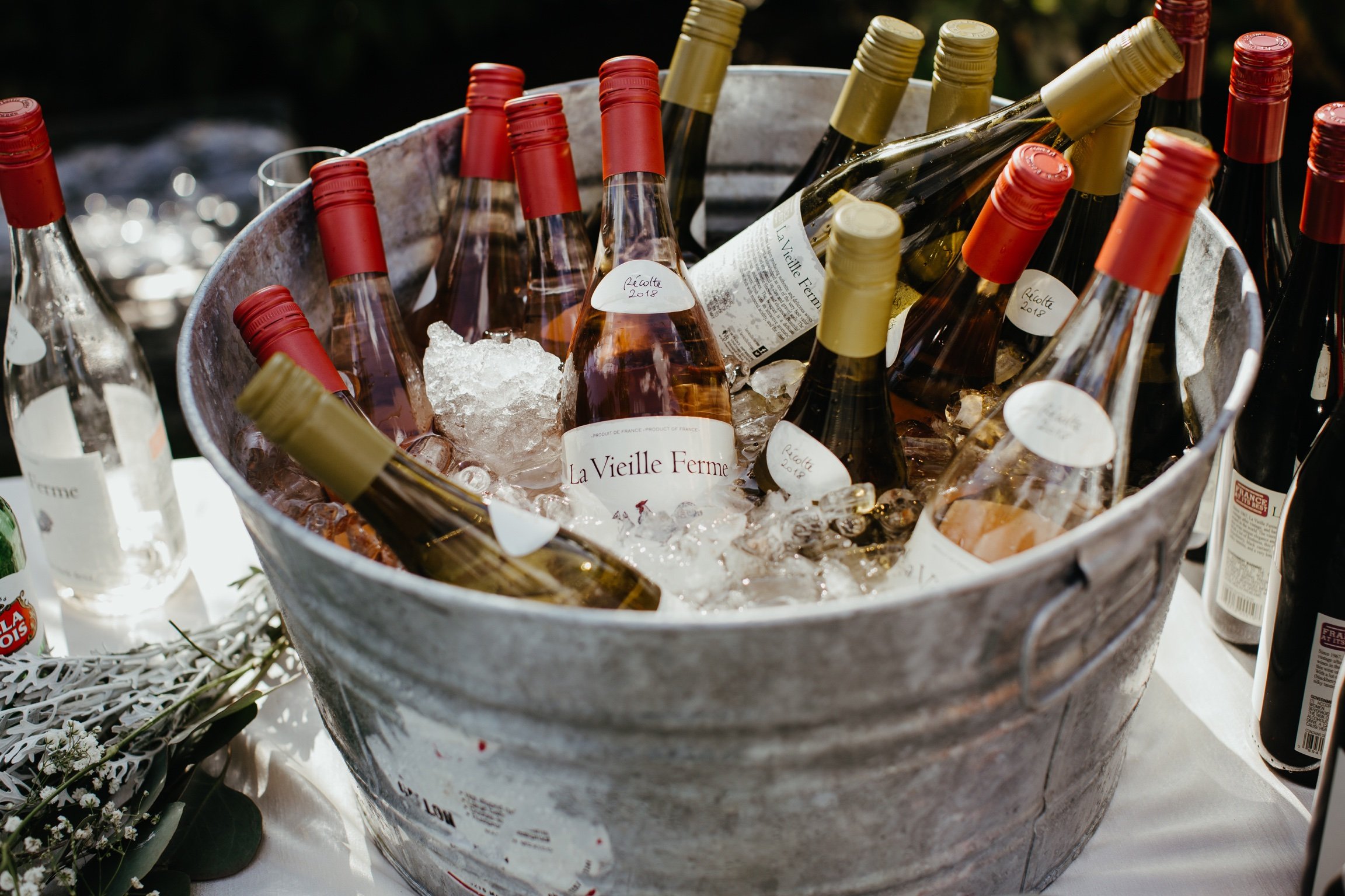 ice bucket of la vielle ferme wine bar at wedding