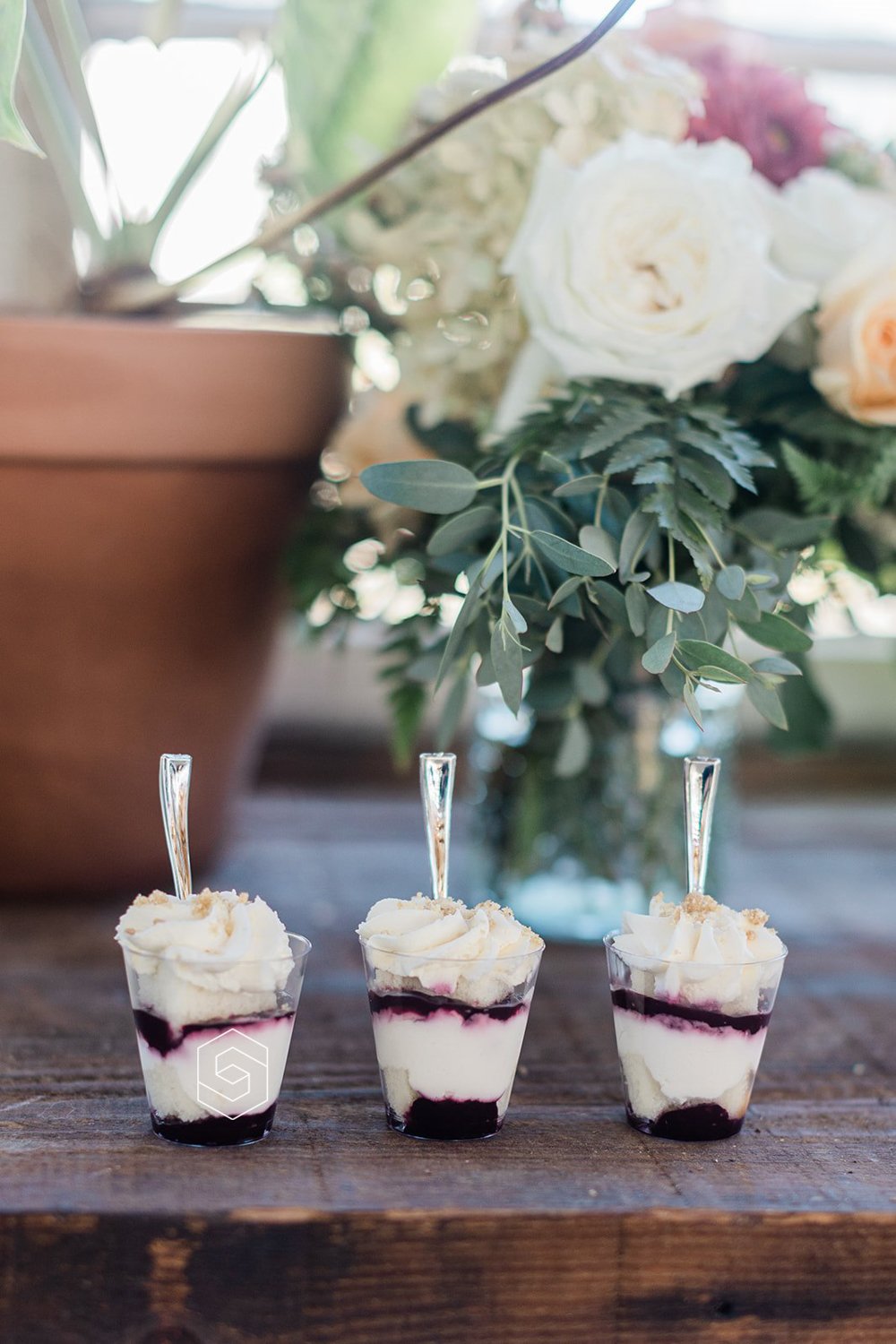 single serving frozen yogurt with berries at wedding dessert bar in portland oregon