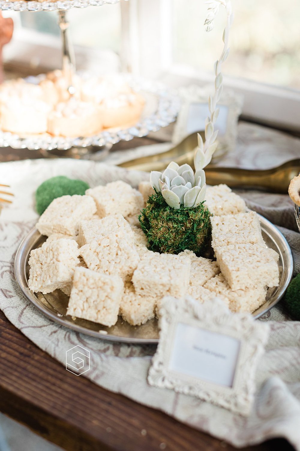 artisan rice crispy treats on wedding dessert bar table