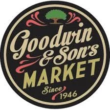Logo of Goodwin & Son's Market, established in 1946, featuring a tree and decorative elements in a circular design.
