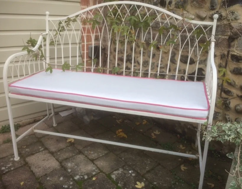 Bench cushion with pink piping