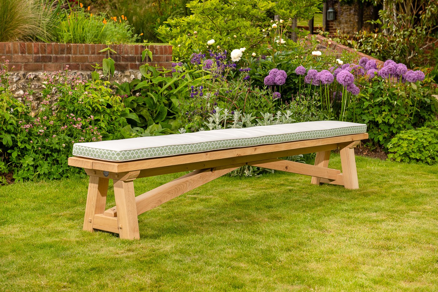 Amelfi green cosmos border bench cushion for Oxenwood