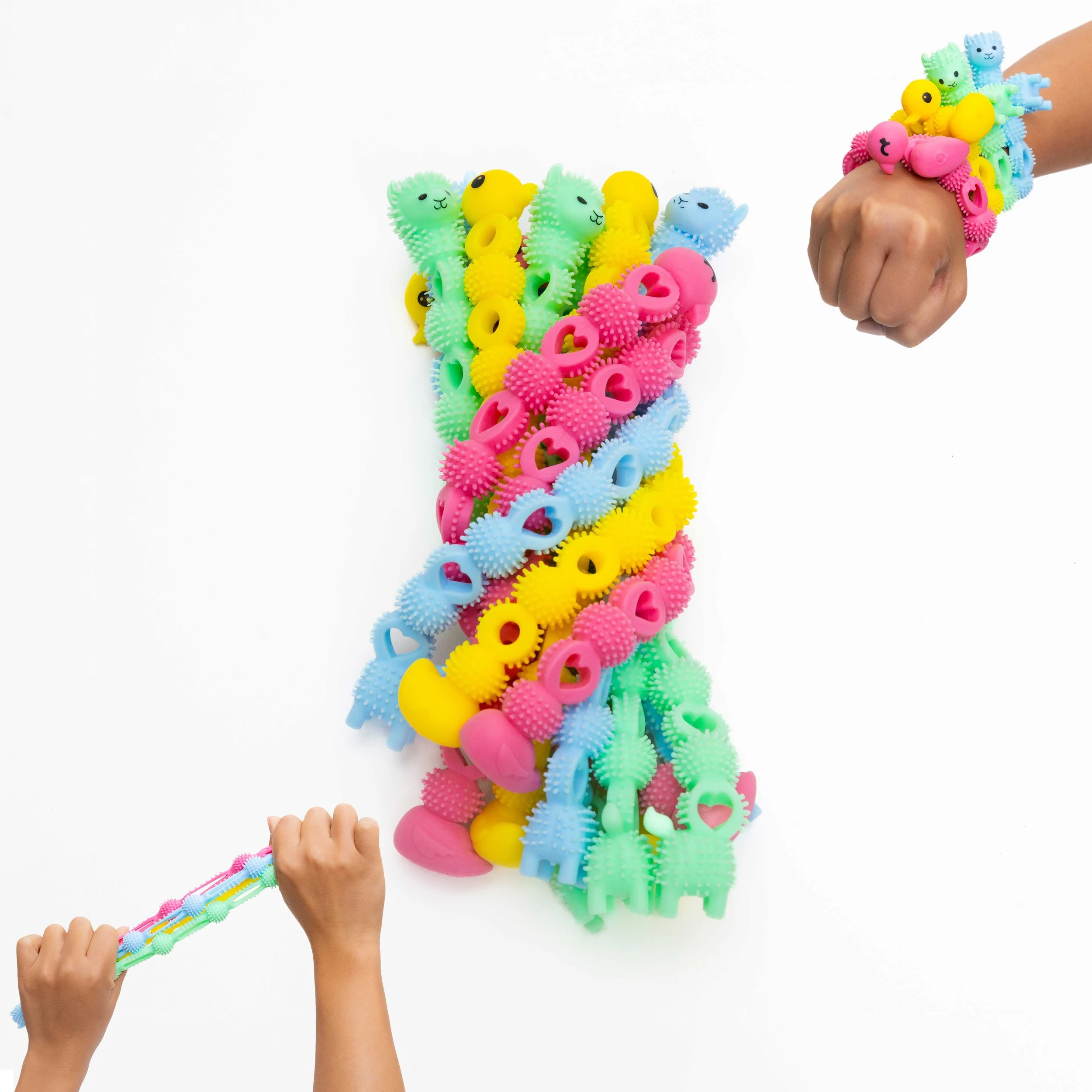 Twelve stretchy buddy bands for sharing and caring