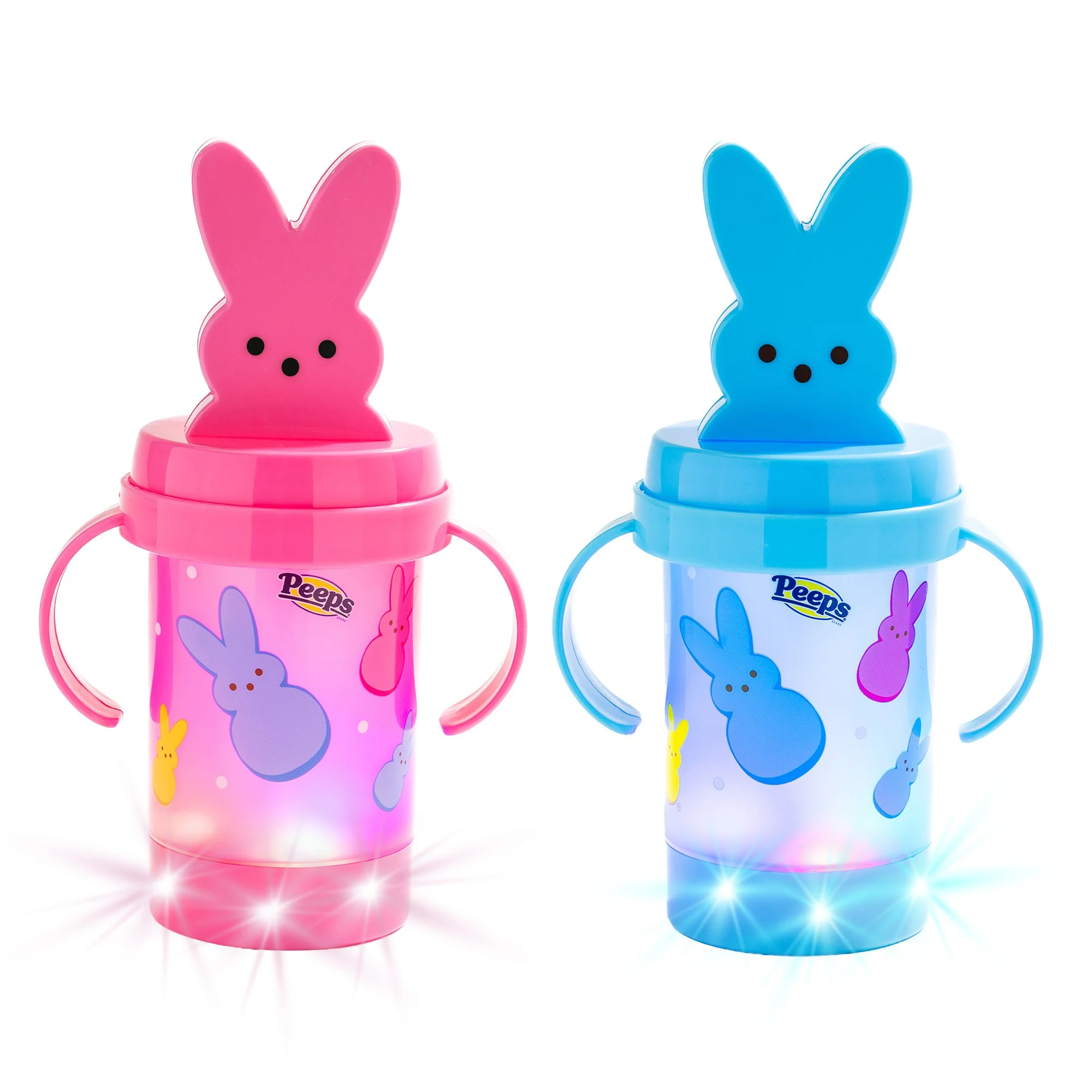 Two glowing Easter sippy cups in cute bunny designs with soft pink and blue colors that light up