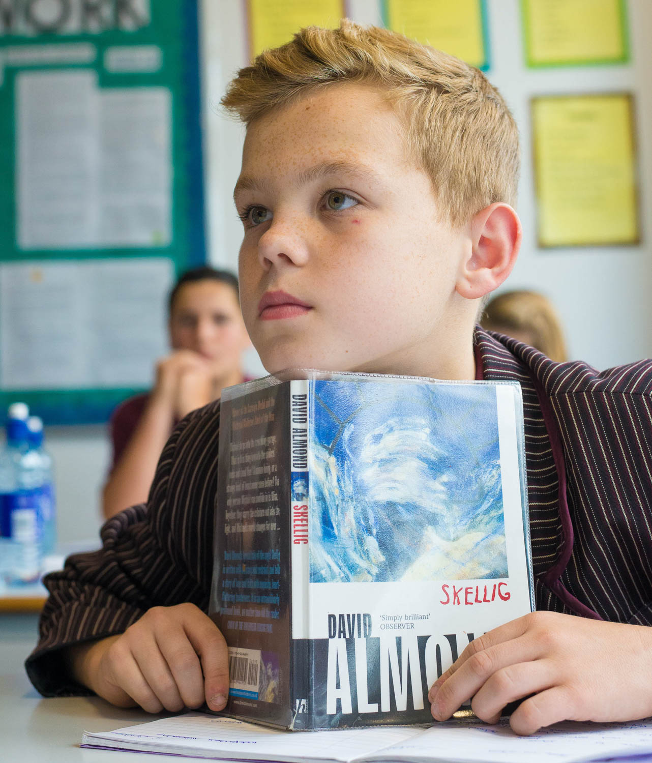 School boy with book