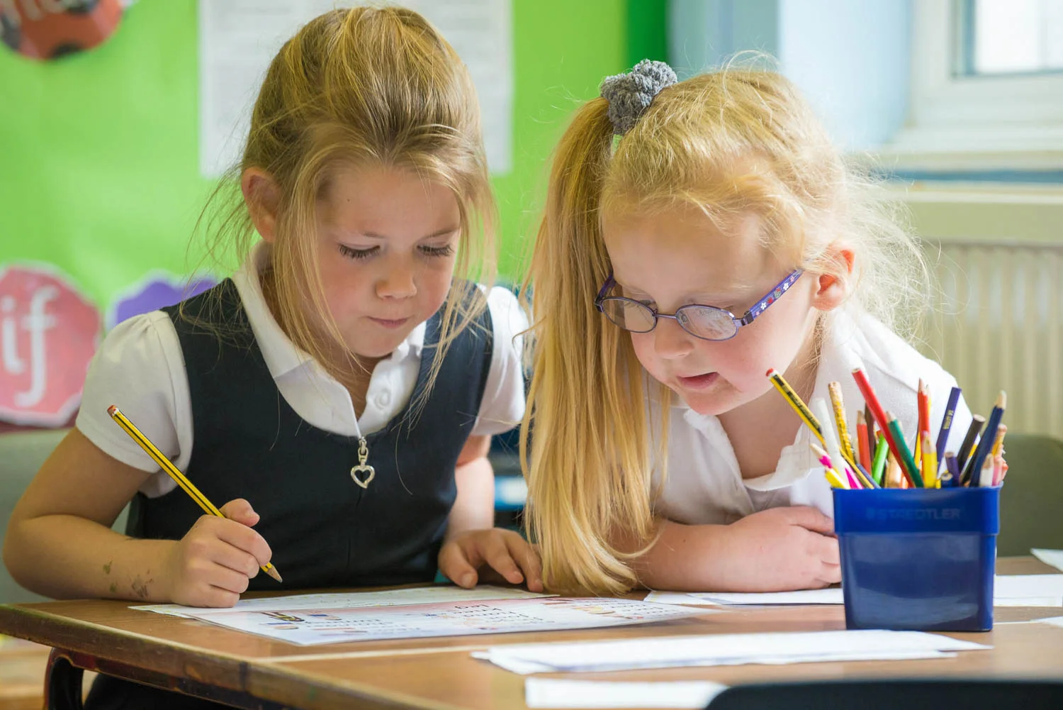 School girls at desk
