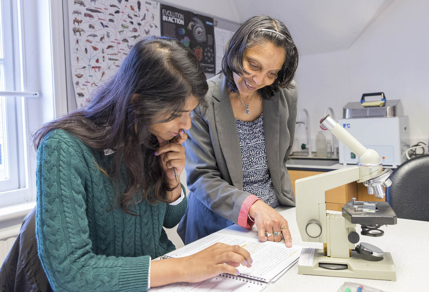 Student using microscope