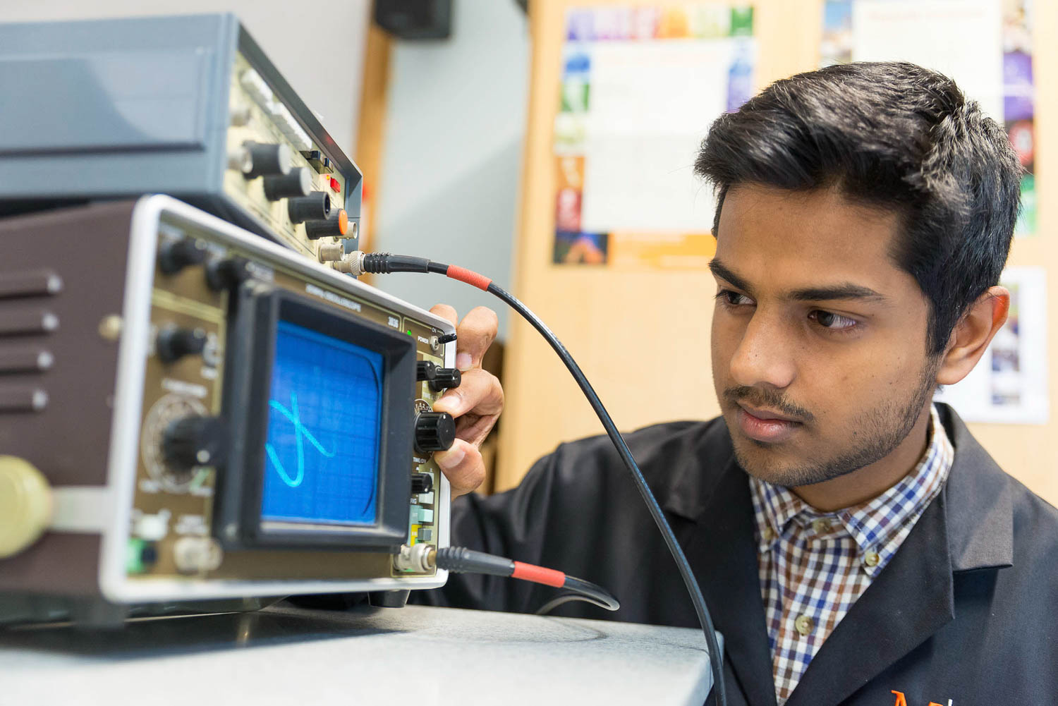 Student with wave form monitor