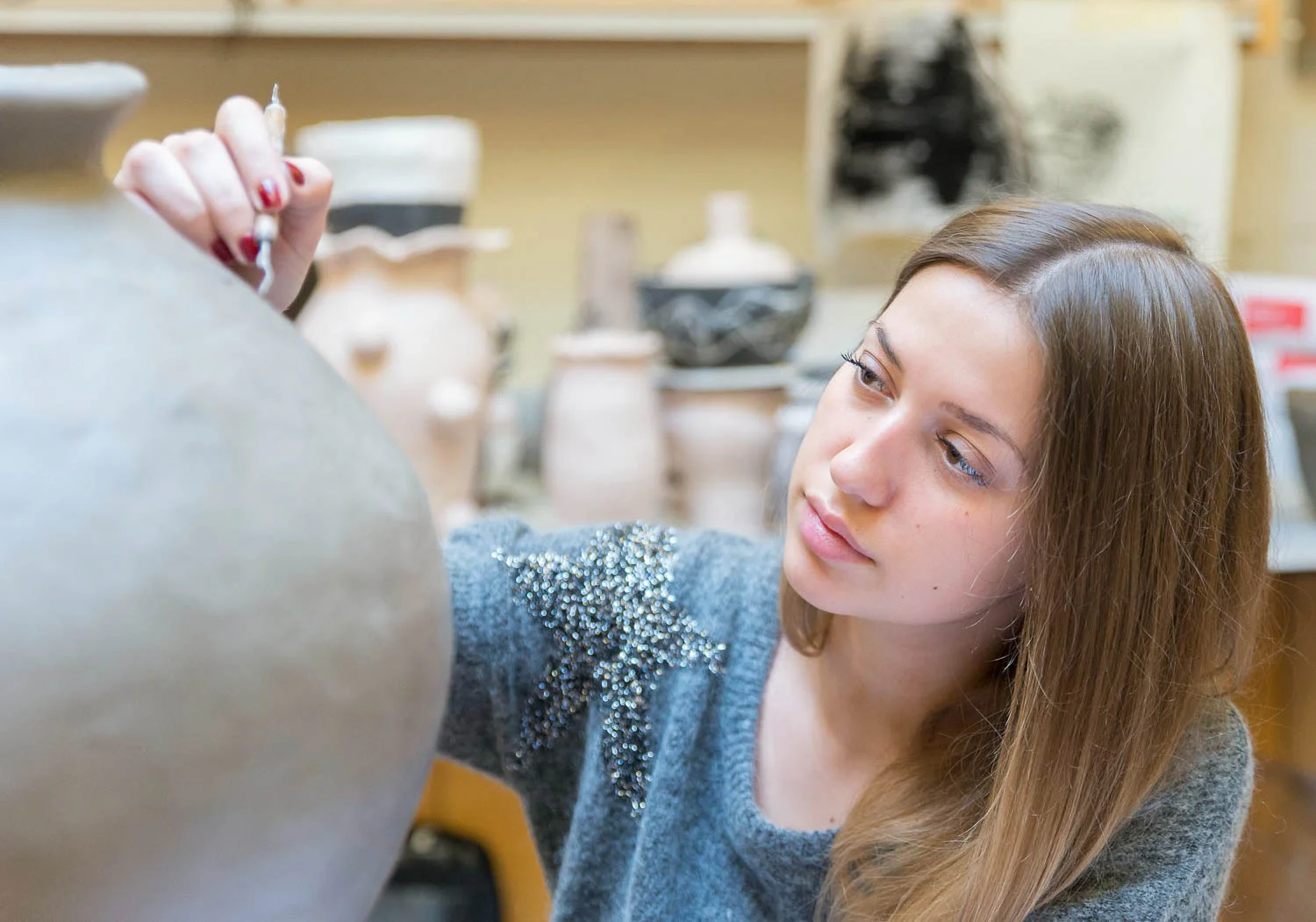 Ceramics student