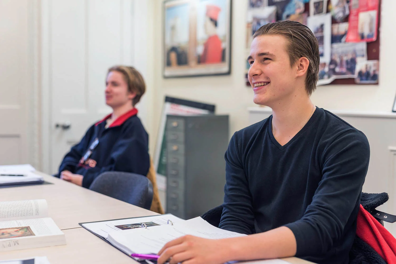 Smiling student in class