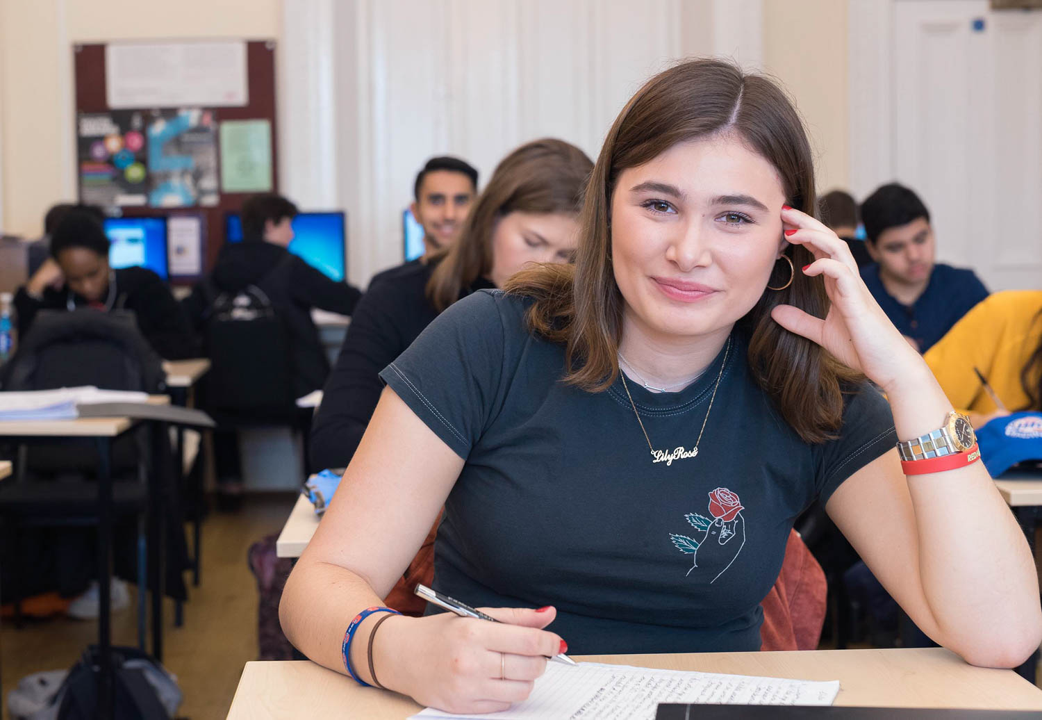 Smiling student in class