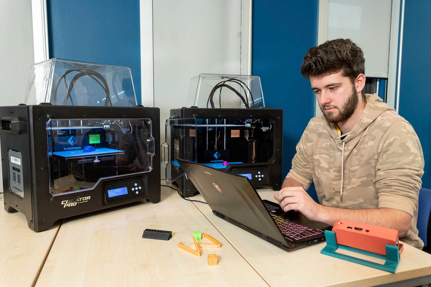 Student and 3D printers