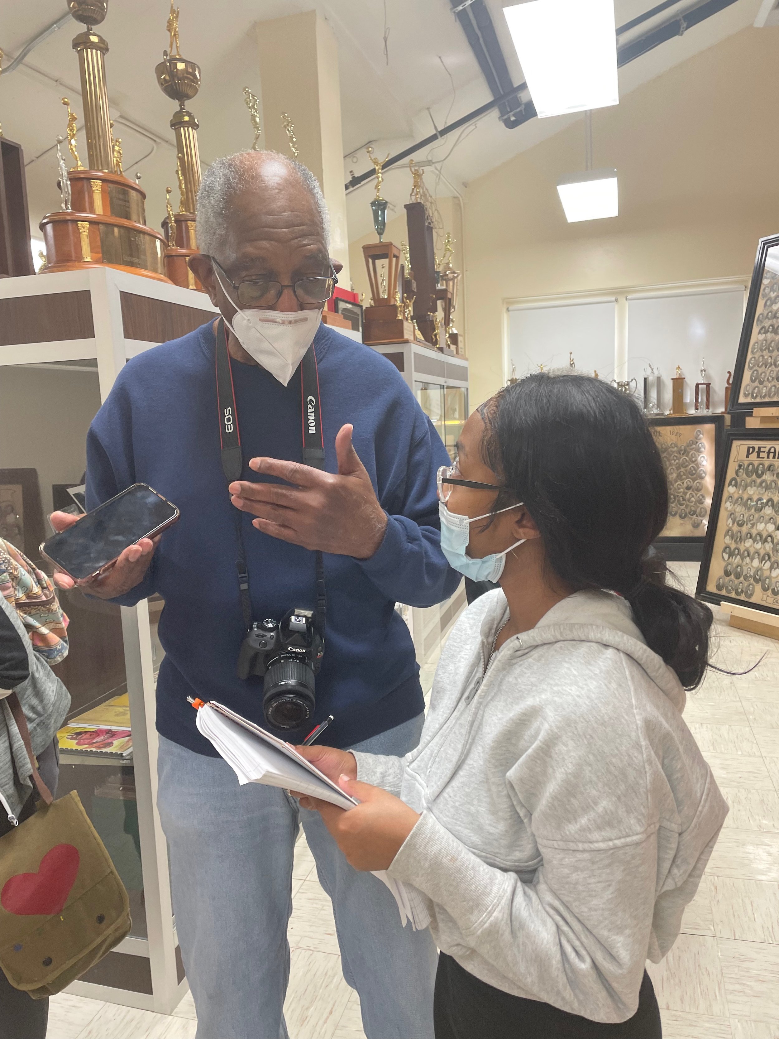 Aaliyah Riddle interviewing Mr. Henry Irvin, Jr., member of the Pearl High Alumni Association