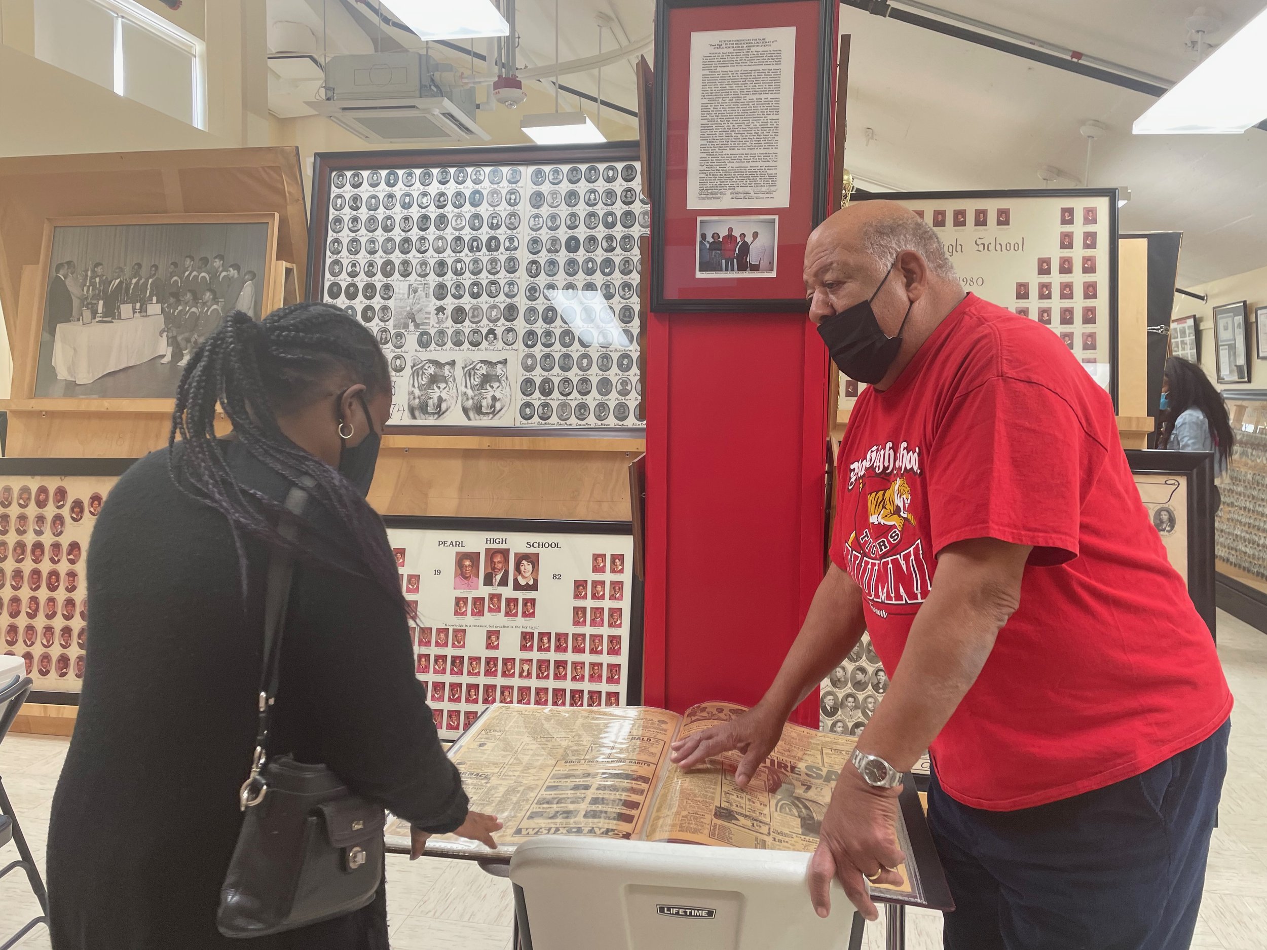 Dr. Collins working with Mr. Melvin Black the archivist for the Pearl High Alumni Association