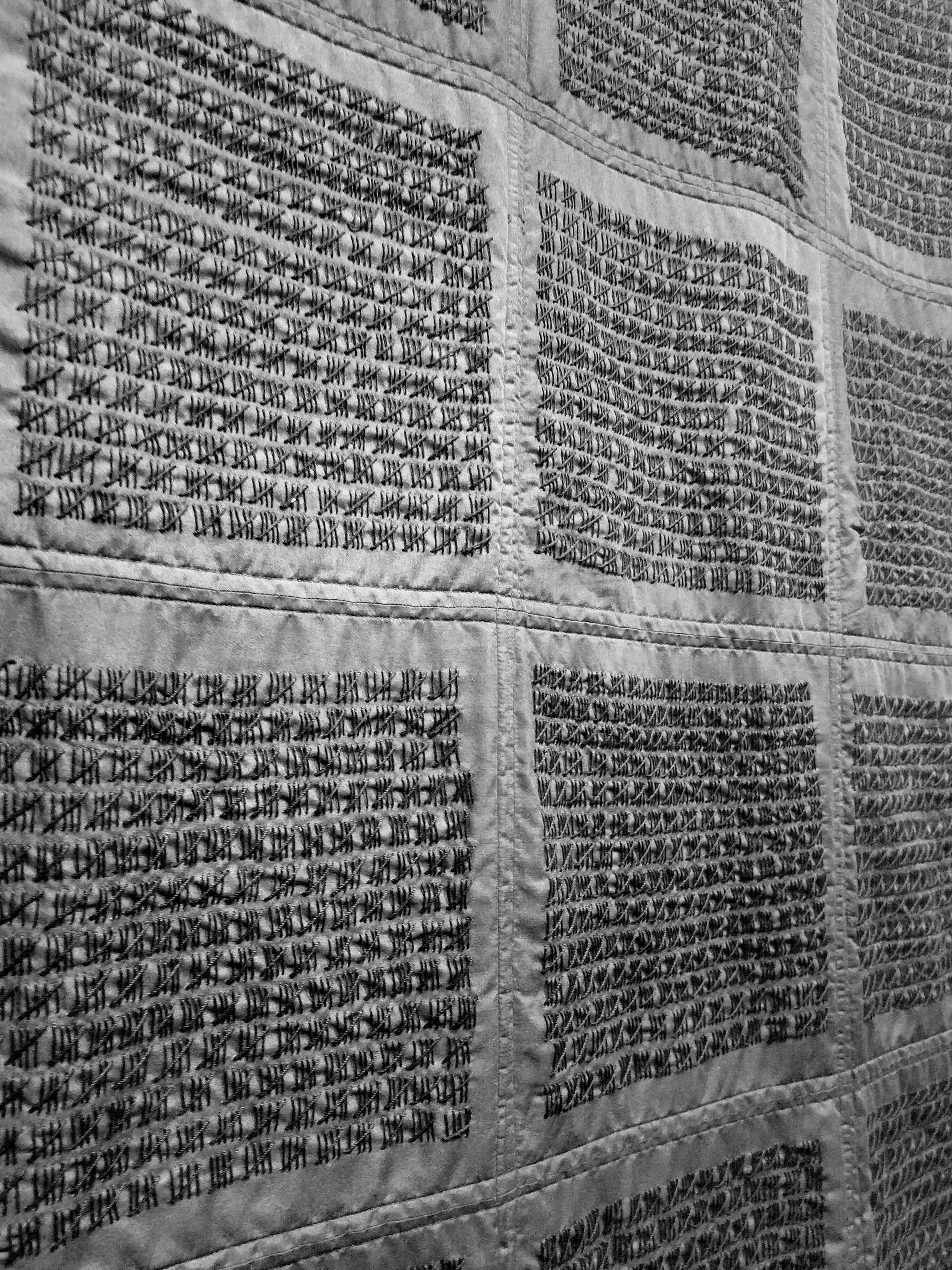 Black tally mark quilt (detail). Crochet thread on muslin, approximately 75,000 hand stitched tally marks. 72”x 72”