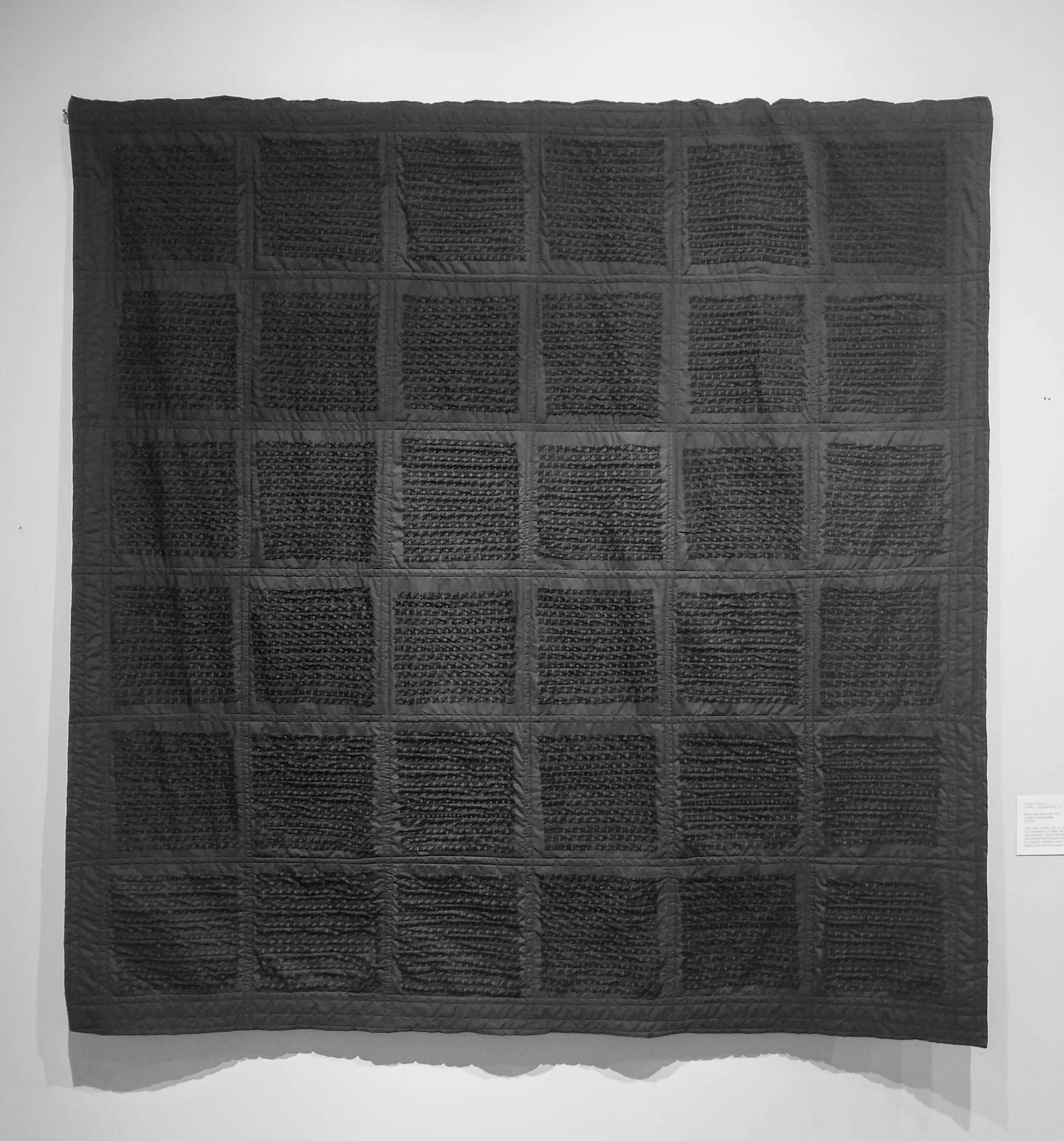 Black tally mark quilt. Crochet thread on muslin, approximately 75,000 hand stitched tally marks. 72”x 72”