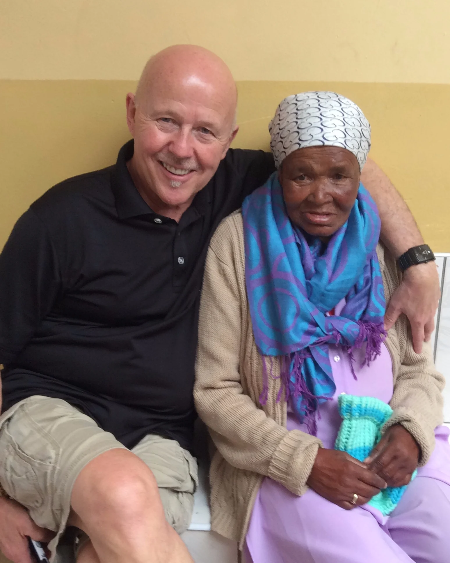 Jim Cassidy, AIAIA President, annually visits residents of the Missionaries of Charity home in Khayelitsha