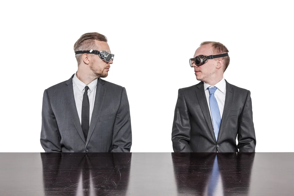 two men light background AdobeStock_112473997-Edit.jpg