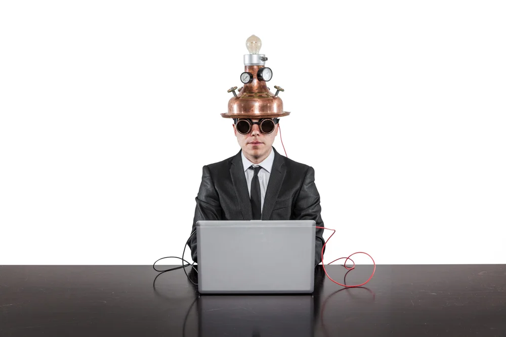 laptop mind hat WHITE AdobeStock_112744066-Edit.jpg