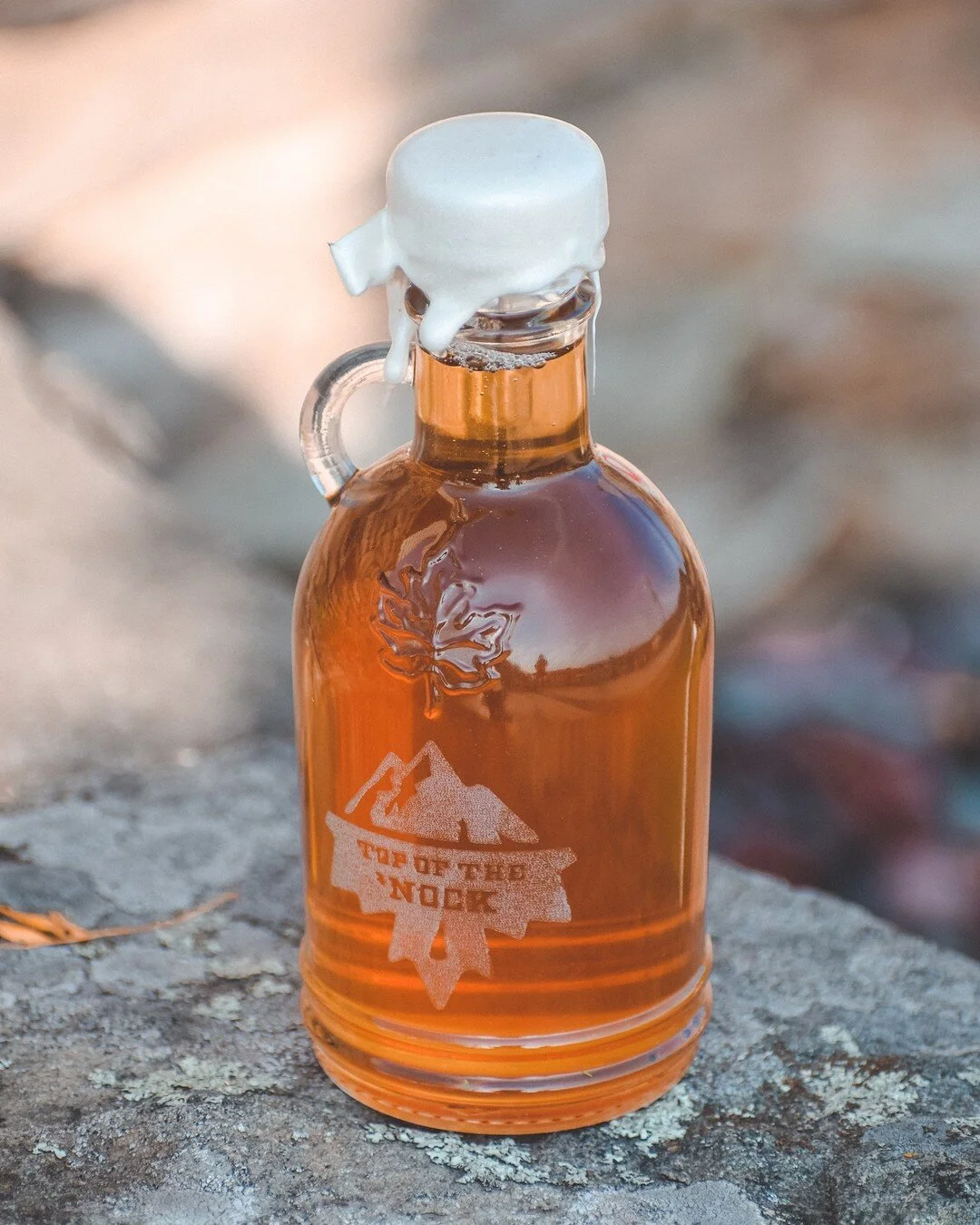 Our new etched glass bottles are AVAILABLE NOW! Get your bottles on topofthenock.com/shop.