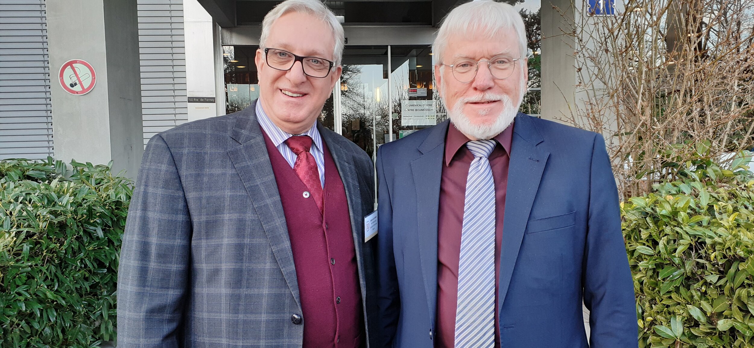 Christopher Stuckelberger with Samer Laham at the entry of WCC ecumenical center 3 .jpg