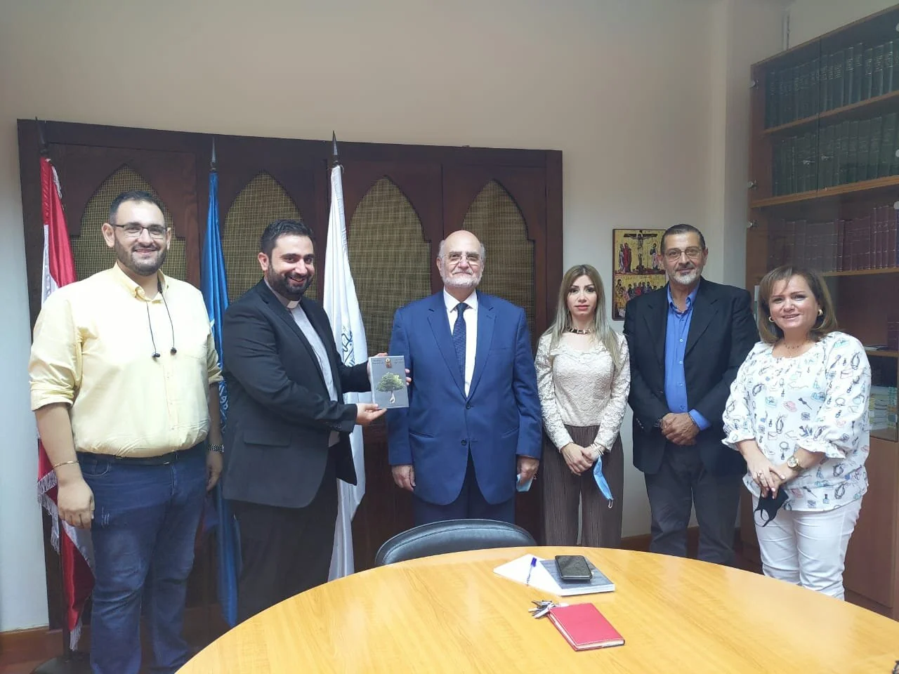 The Secretary General Dr. Michel Abs welcomed Father Melki with the “Roots Don’t Die” team