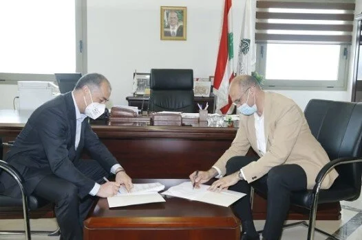 Hasan and Bou Saab Signed an Agreement to Secure Pfizer Vaccines for the Lebanese Canadian Hospita, photo credit: MOPH.l