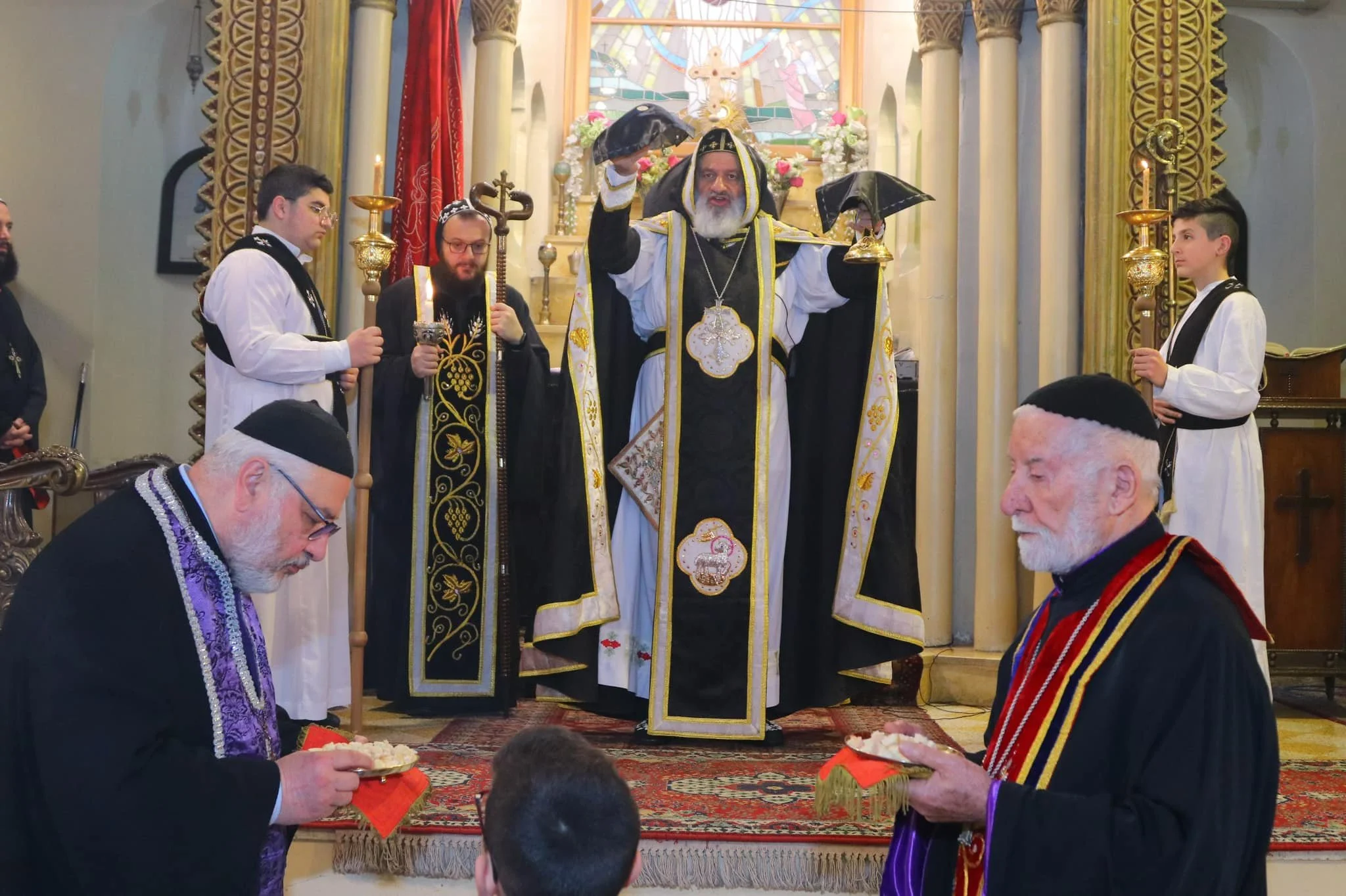 His Holiness Patriarch Mor Ignatius Aphrem Il celebrates the Holy Qurobo on Maundy Thursday at St. George Church in Hay El-Seryan in Aleppo