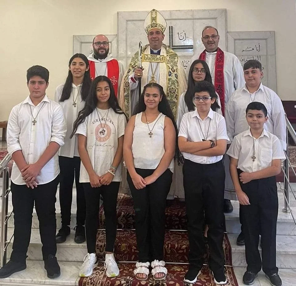His Eminence Archbishop Hosam Naoum Administers the Sacrament of Confirmation at St. Paul’s Church – Al Ashrafieh in Amman