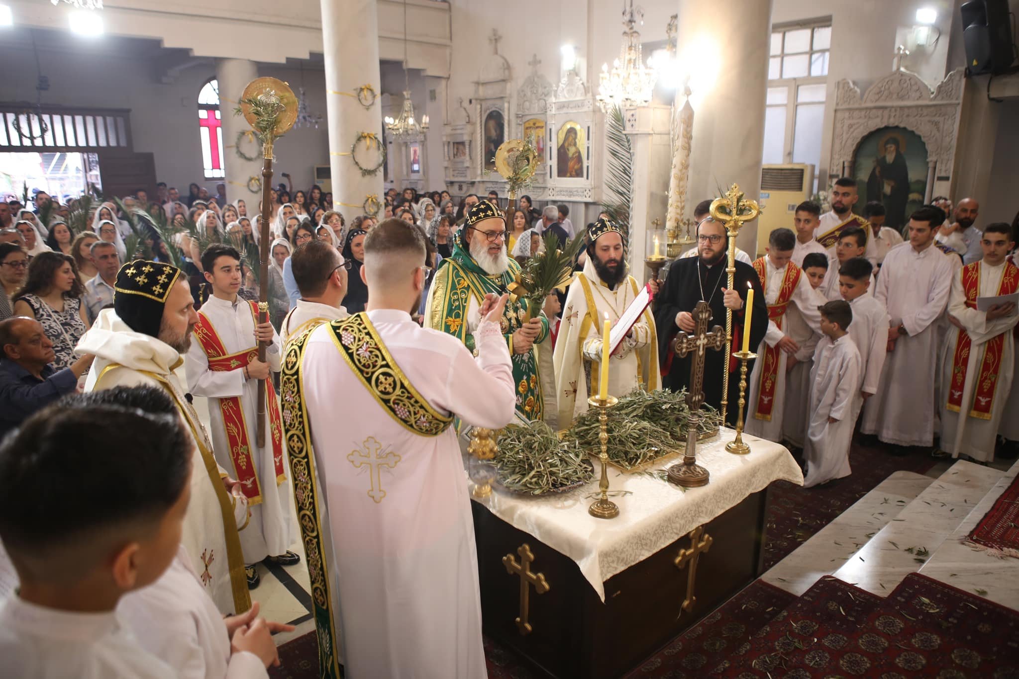 His Holiness Patriarch Mor Ignatius Aphrem II celebrates the Holy Qurobo on the occasion of Palms Sunday